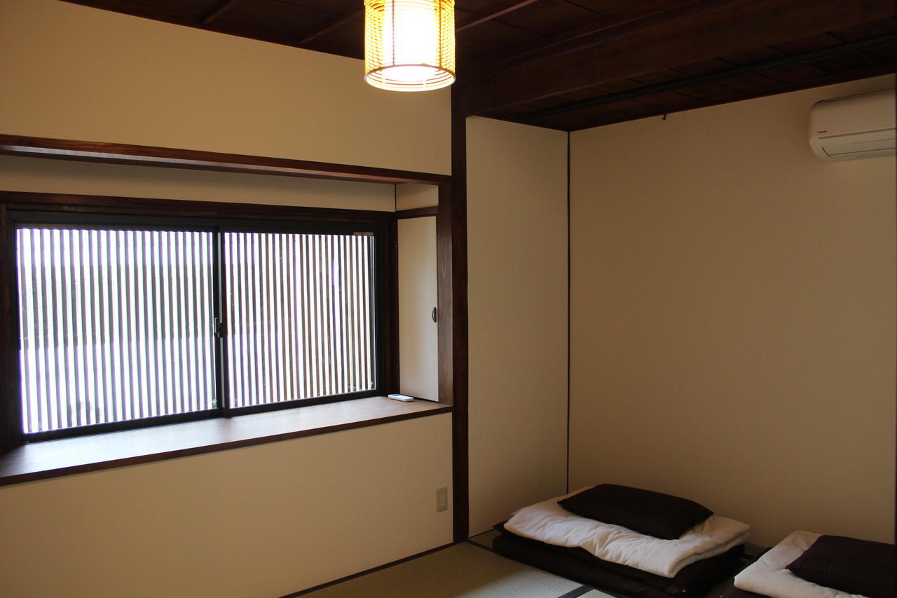 Tenma Itoya Guest House Osaka Habitación foto